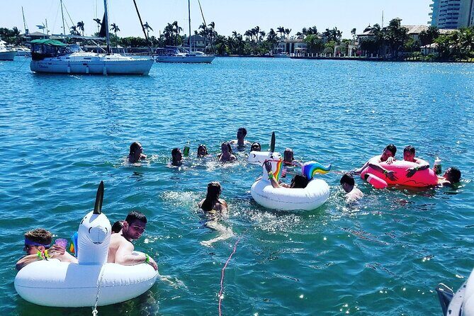 Family Friendly Boat Cruise and Swim - Stop 2: downtown views and Yacht Club sunset energy